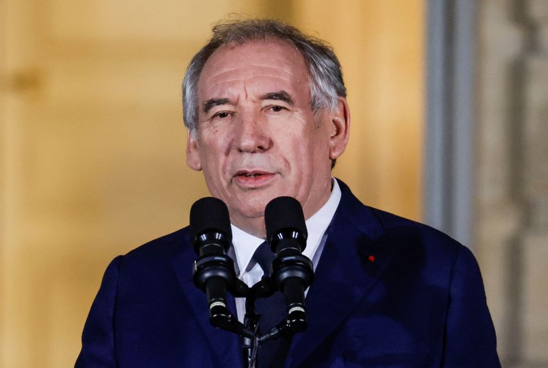 © Reuters. Newly appointed Prime Minister Francois Bayrou speaks, on the day of the handover ceremony at the Hotel Matignon in Paris, France, December 13, 2024. REUTERS/Abdul Saboor/Pool