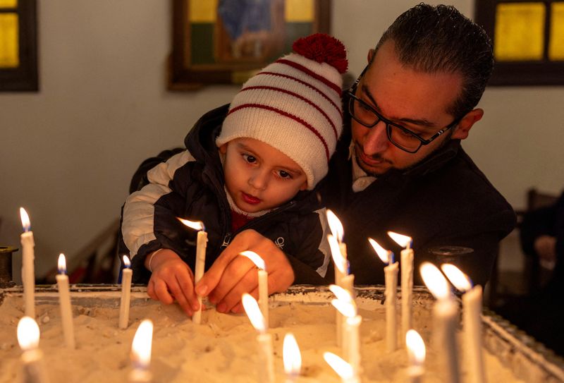 © Reuters. St. George's Cathedral, Latakia, Syria, December 15, 2024. REUTERS/Umit Bektas