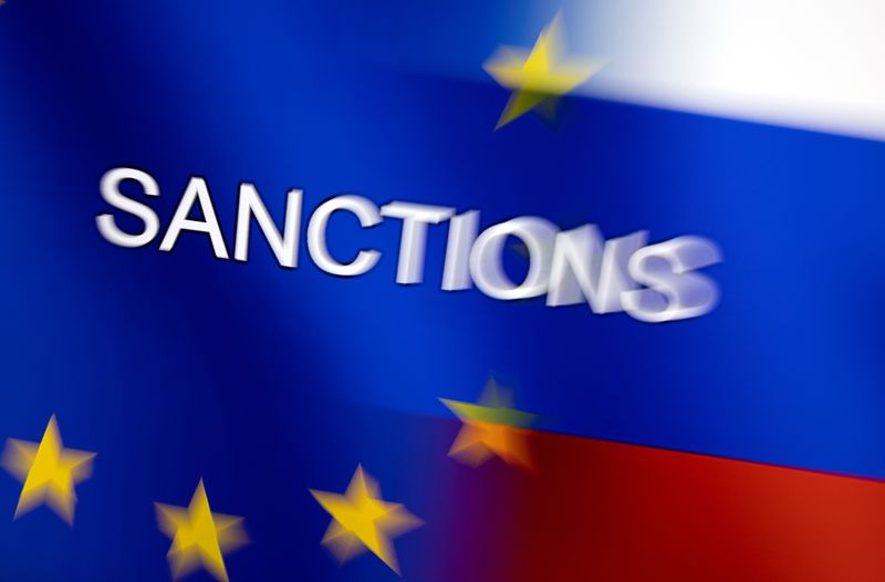 &copy; Reuters. Word "Sanctions" is displayed on EU and Russian flags in this illustration taken, February 27, 2022. REUTERS/Dado Ruvic/Illustration/Files