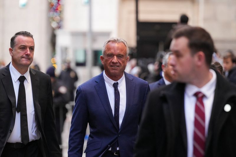 &copy; Reuters. Robert F. Kennedy Jr. walks near the New York Stock Exchange (NYSE), on the day U.S. President-elect Donald Trump rings the opening bell at NYSE to celebrate being named Time magazine's 'Person of the Year', in New York City, New York, U.S., December 12, 