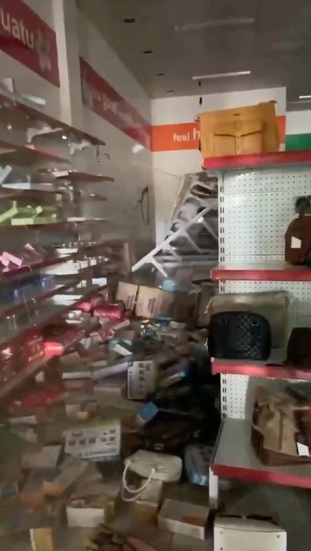 © Reuters. Products lie scattered across the floor following a strong earthquake in Port Vila, Vanuatu, December 17, 2024 in this screengrab obtained from a social media video. Tana Plaza Pharmacy/via REUTERS