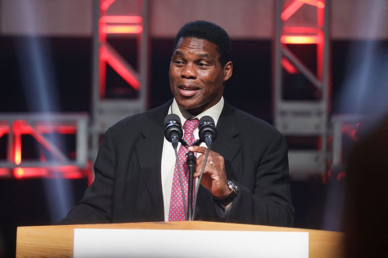 &copy; Reuters. FILE PHOTO: Republican U.S. Senate candidate Herschel Walker speaks during a U.S. midterm runoff election night party in Atlanta, Georgia, U.S., December 6, 2022. REUTERS/Alyssa Pointer/File Photo 