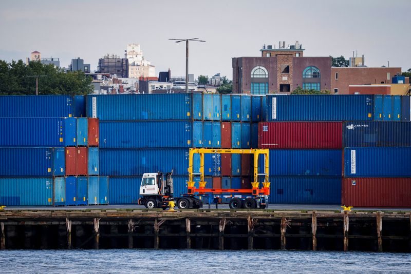 &copy; Reuters. FILE PHOTO: Shipping containers are stacked on a pier at the Red Hook Terminal in Brooklyn, New York, U.S., September 20, 2024.  REUTERS/Brendan McDermid/File Photo