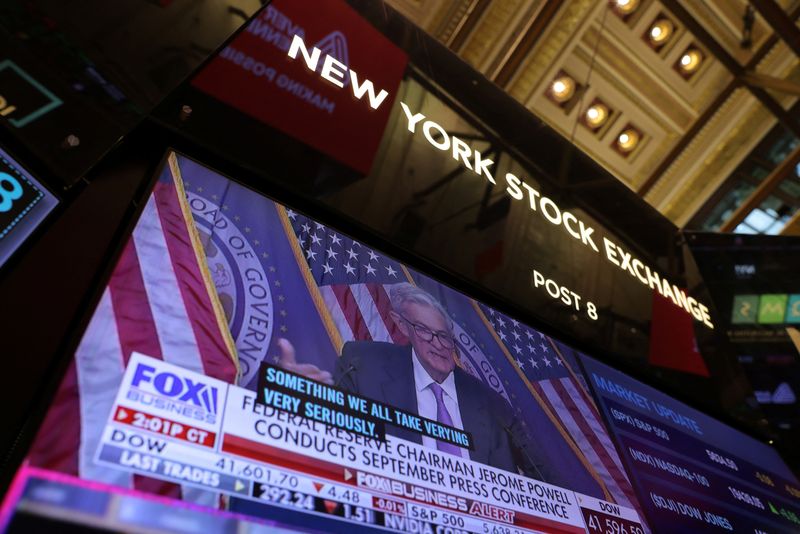 &copy; Reuters. A screen on the trading floor at The New York Stock Exchange (NYSE) display a news conference with Federal Reserve Chair Jerome Powell following the Federal Reserve rate announcement, in New York City, U.S., September 18, 2024. REUTERS/Andrew Kelly/File P