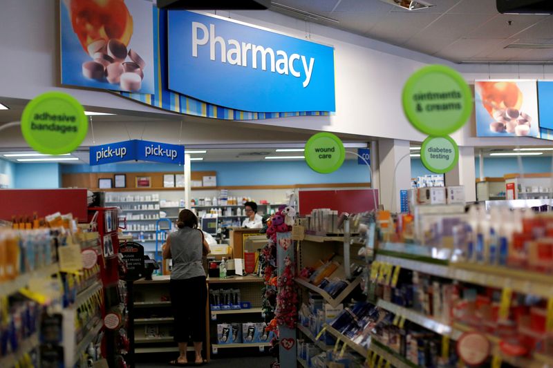 &copy; Reuters. A customer waits at the counter of a CVS Pharmacy store in Pasadena, U.S., May 2, 2016. REUTERS/Mario Anzuoni/File Photo