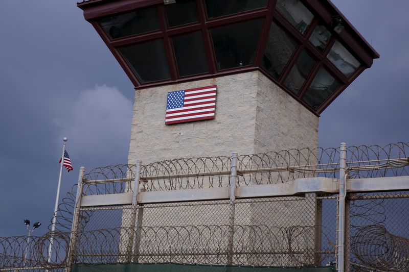 © Reuters. FILE PHOTO: The United States flag decorates the side of a guard tower inside of Joint Task Force Guantanamo Camp VI at the U.S. Naval Base in Guantanamo Bay, Cuba March 22, 2016.  REUTERS/Lucas Jackson/File Photo