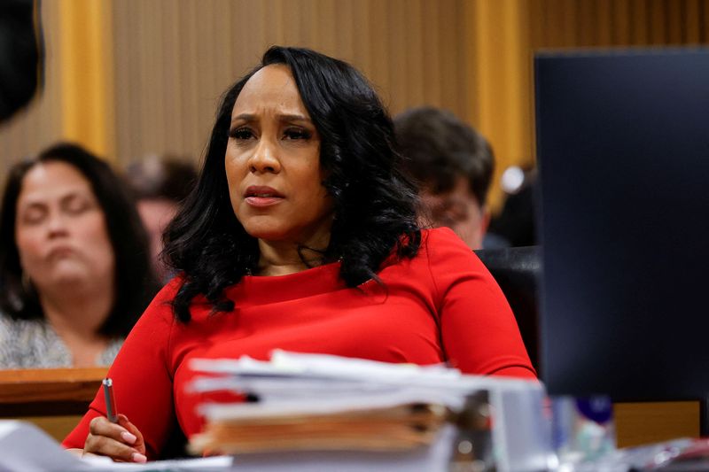 &copy; Reuters. FILE PHOTO: Fulton County District Attorney Fani Willis attends a hearing on the Georgia election interference case, March 1, 2024, in Atlanta, Georgia, U.S. Alex Slitz/Pool via REUTERS/File Photo