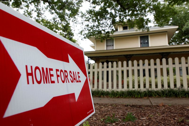 &copy; Reuters. FILE PHOTO: A sale sign points to a home in Dallas, Texas September 24, 2009. REUTERS/Jessica Rinaldi/File Photo