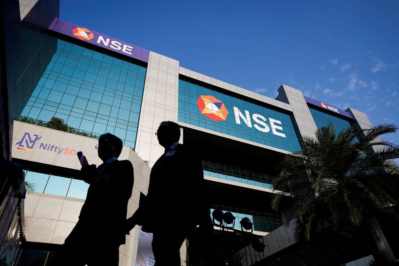 &copy; Reuters. FILE PHOTO: People walk outside the National Stock Exchange (NSE) in Mumbai, India, October 22, 2024. REUTERS/Francis Mascarenhas/File Photo