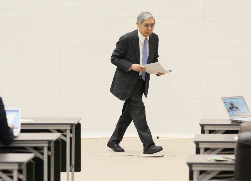 © Reuters. FILE PHOTO: Bank of Japan (BOJ) Governor Haruhiko Kuroda leaves after his last news conference as Japan's central bank chief at the BOJ headquarters in Tokyo, Japan April 7, 2023.  Toru Kawata/Pool via REUTERS/File Photo