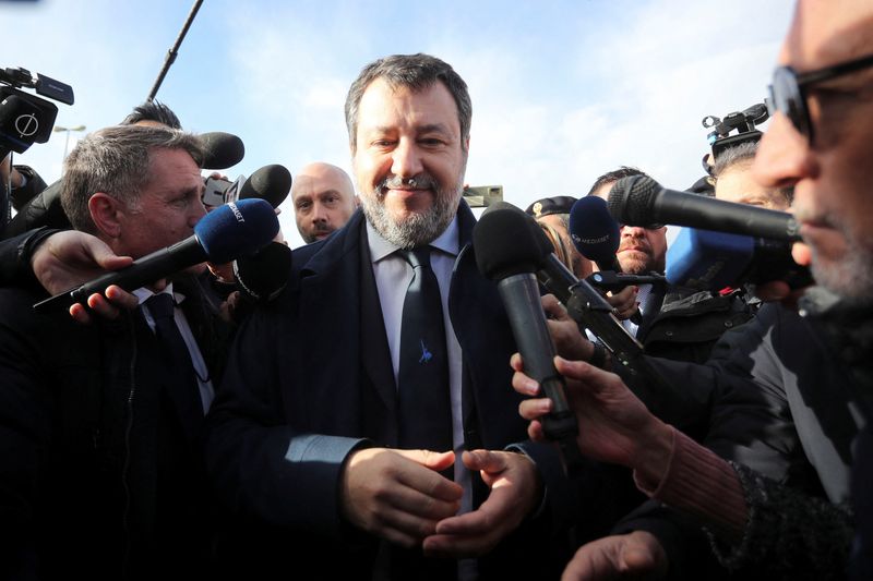 &copy; Reuters. Italian Deputy Prime Minister Matteo Salvini speaks to media upon his arrival at Pagliarelli bunker courthouse for a hearing in the trial over his 2019 decision to prevent more than 100 migrants from landing in the country, in Palermo, Italy, December 20,