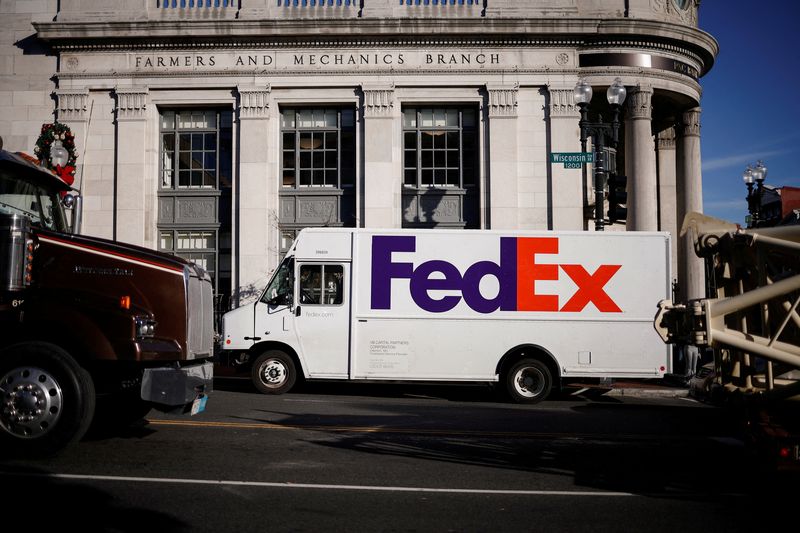 &copy; Reuters. FILE PHOTO: A FedEx delivery truck is pictured during Black Friday preparations in the Georgetown neighborhood of Washington, U.S., November 26, 2024. REUTERS/Benoit Tessier/File Photo