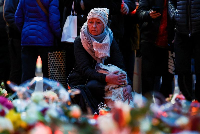 German authorities probe motive in deadly Christmas market attack