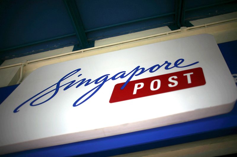 © Reuters. FILE PHOTO: The Singapore Post sign at a post office in Singapore November 2, 2015.  REUTERS/Thomas White/File Photo