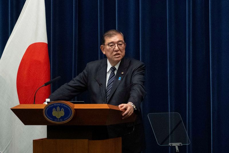 © Reuters. Japan's Prime Minister Shigeru Ishiba speaks during a press conference at the prime minister's office in Tokyo, Japan, on December 24, 2024.     YUICHI YAMAZAKI/Pool via REUTERS