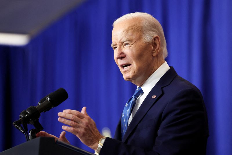 © Reuters. FILE PHOTO: U.S. President Joe Biden speaks during his visit to the Department of Labor for an event honoring the country's labor history and Frances Perkins, the longest-serving U.S. Secretary of Labor, in Washington, United States, on December 16, 2024. REUTERS/Kevin Lamarque/File Photo