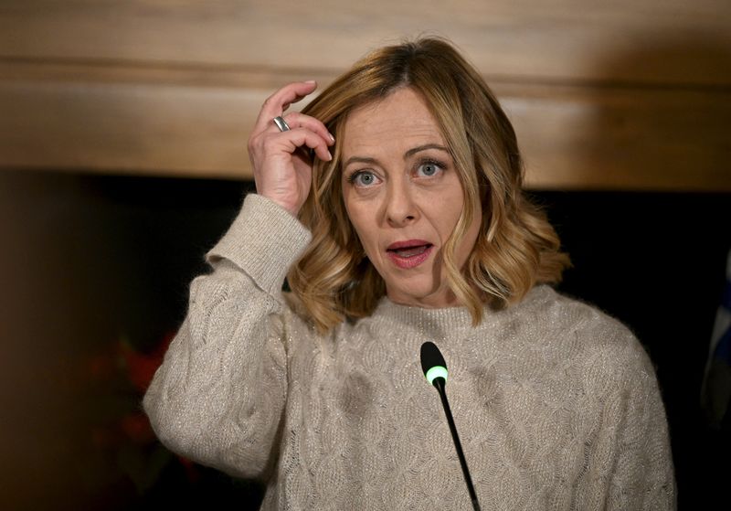 © Reuters. FILE PHOTO: Italy's Prime Minister Giorgia Meloni attends a press conference of the North-South Summit in Saariselka, Finnish Lapland, December 22, 2024. Lehtikuva/Antti Aimo-Koivisto via REUTERS/File Photo