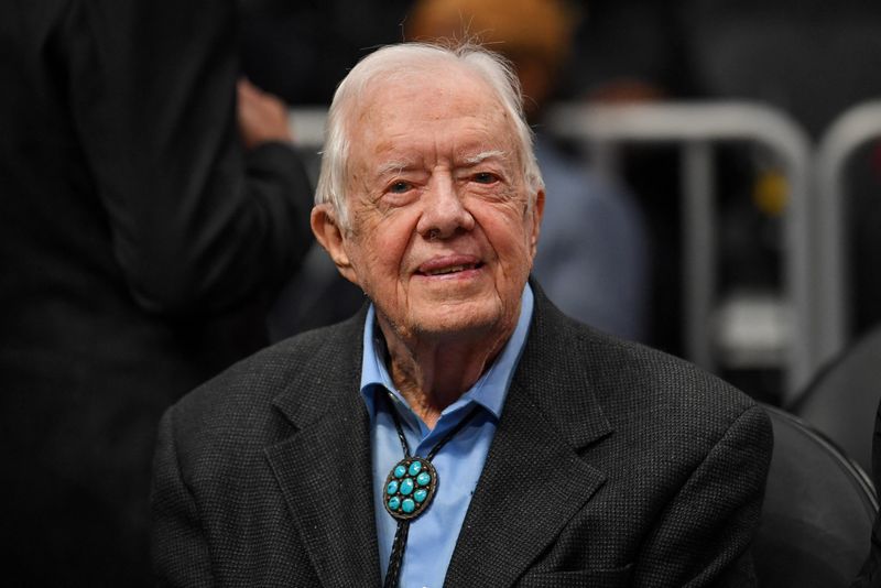 © Reuters. FILE PHOTO: Feb 14, 2019; Atlanta, GA, USA; Former USA president Jimmy Carter shown at the game between the Atlanta Hawks and the New York Knicks at State Farm Arena. Mandatory Credit: Dale Zanine-USA TODAY Sports/File Photo