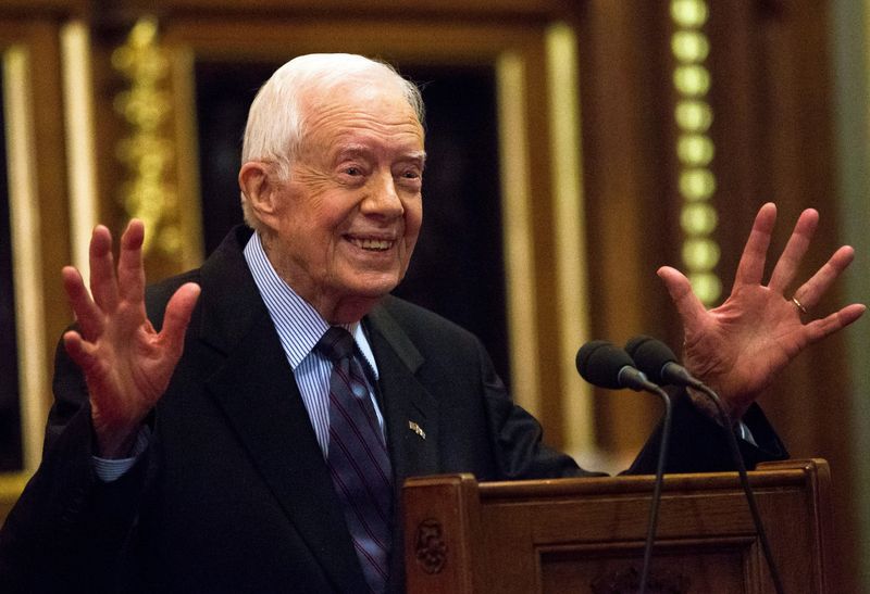 © Reuters. FILE PHOTO: Former U.S. President Jimmy Carter delivers a lecture on the eradication of the Guinea worm, at the House of Lords in London, Britain February 3, 2016. REUTERS/Neil Hall/File Photo