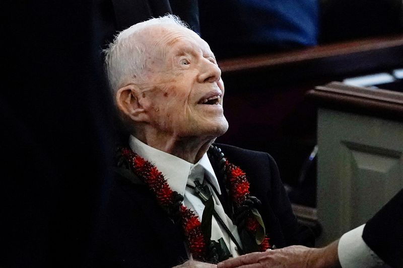 &copy; Reuters. Former U.S. President Jimmy Carter departs after the funeral service for former U.S. first lady Rosalynn Carter at Maranatha Baptist Church, in Plains, Georgia, U.S. November 29, 2023. Alex Brandon/Pool via REUTERS/File Photo