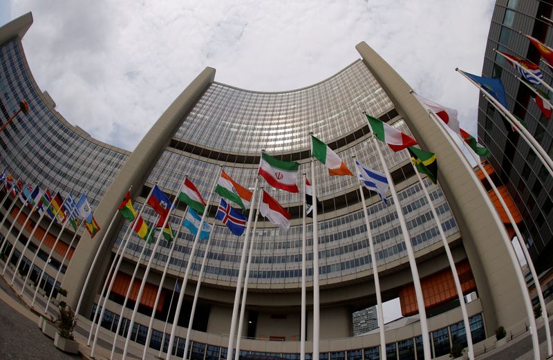 © Reuters. Iranian and other flags flutter in front of the International Atomic Energy Agency headquarters in Vienna, Austria, June 5, 2023. REUTERS/Leonard Voyager/File Photo