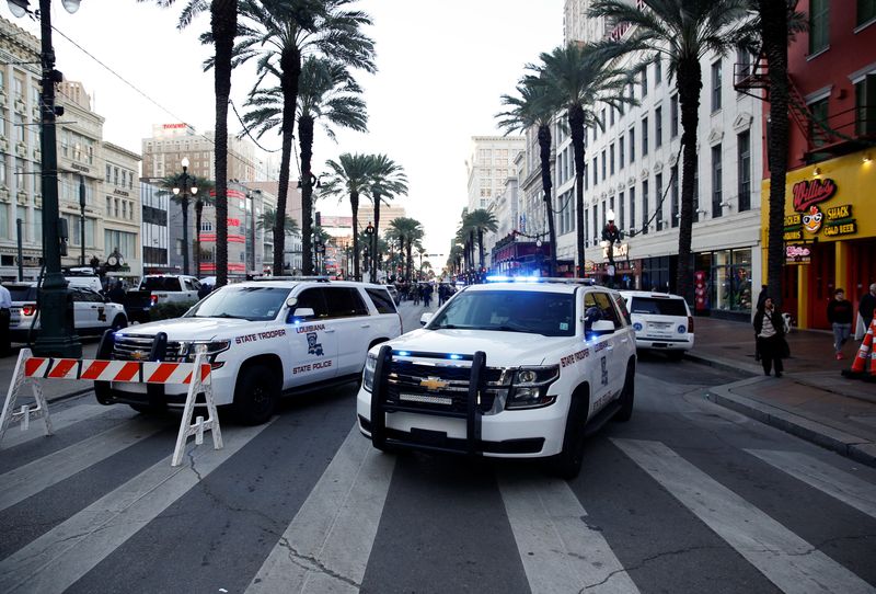 © Reuters. Louisiana State Police vehicles operate near the site where people were killed by a man driving a truck in an attack during New Year's celebrations, in New Orleans, Louisiana, US on 1 January 2025. REUTERS/Octavio Jones