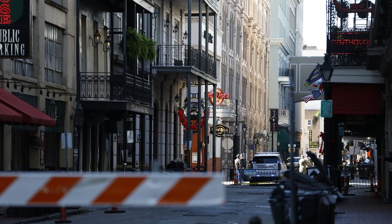 © Reuters. Jan 1, 2025; New Orleans, LA, USA;  Police vehicles on Bourbon Street. The Sugar Bowl CFP quarterfinal between Georgia and Notre Dame was postponed after an attack on Bourbon Street. Mandatory Credit: Geoff Burke-Imagn Images