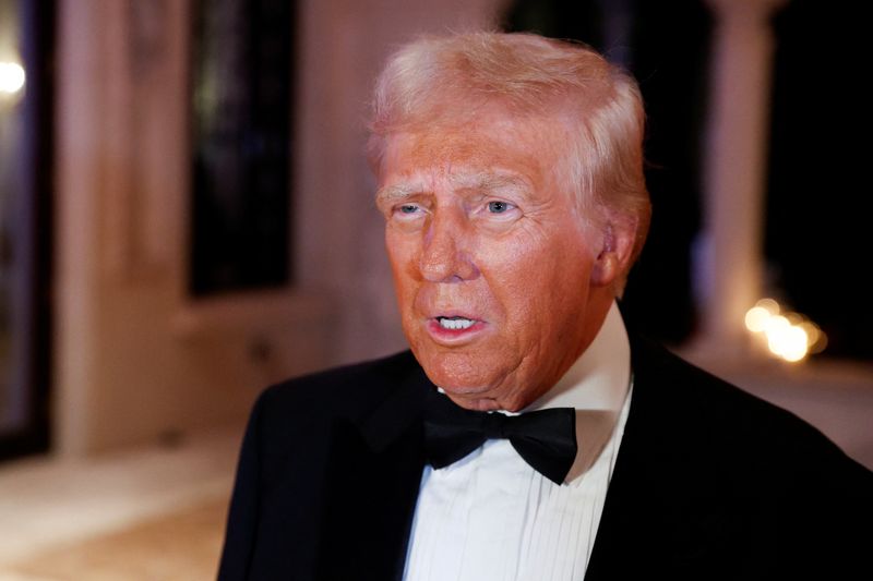 © Reuters. FILE PHOTO: U.S. President-elect Donald Trump attends a New Year's Eve event at Mar-a-Lago in Palm Beach, Florida, U.S., December 31, 2024. REUTERS/Marco Bello/File Photo