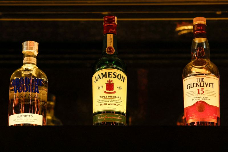 &copy; Reuters. FILE PHOTO: Bottles of Pernod Ricard's brands are displayed at a bar during a photo opportunity, in Gurugram, India, November 26, 2024. REUTERS/Priyanshu Singh/File Photo