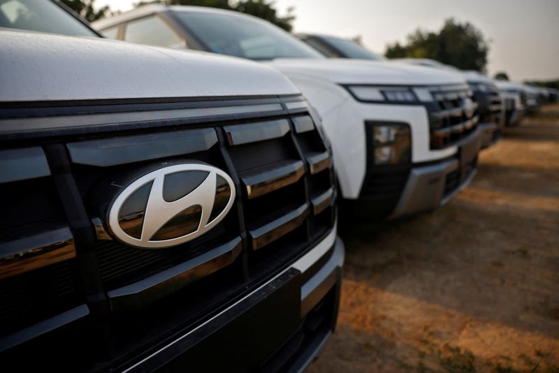 &copy; Reuters. Logo da Hyundai Motor India Limited em veículo estacionado em estabelecimento da empresa na Índian8/10/2024 REUTERS/Amit Dave/Arquivo