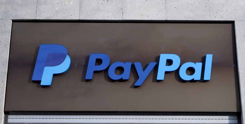 &copy; Reuters. FILE PHOTO: The PayPal logo is seen at an office building in Berlin, Germany, March 5, 2019.   REUTERS/Fabrizio Bensch/File Photo