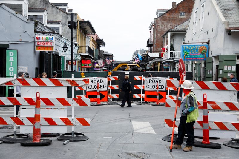 © Reuters. Bourbon Street was closed to traffic as workers began removing old models of traffic barriers along Bourbon Street, which the city has begun replacing, three days after a U.S. Army veteran drove his truck through the crowded French Quarter on New Year's Day. In New Orleans. Louisiana, United States January 4, 2025. Reuters/Octavio Jones