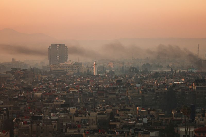 © Reuters. FILE PHOTO: A general view of the city during the year's first sunrise on New Year's Day, after the ousting of Syria's Bashar al-Assad, in Damascus, Syria, January 1, 2025. REUTERS/Amr Abdallah Dalsh/File Photo