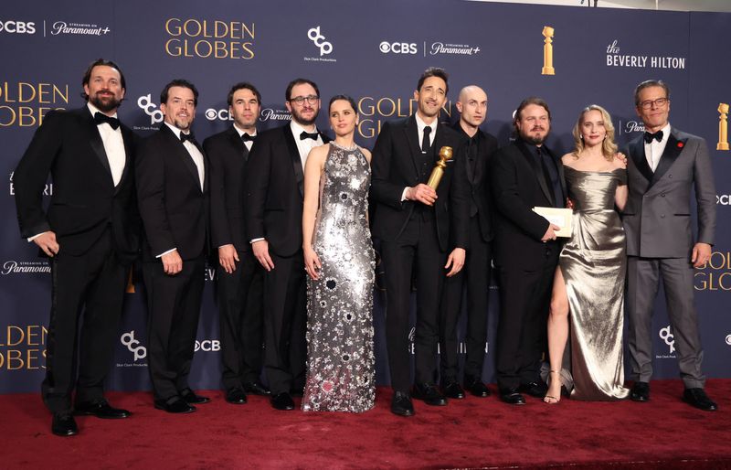 © Reuters. Trevor Matthews, Brian Young, Felicity Jones, Adrien Brody, winner of the Best Performance by a Male Actor in a Motion Picture - Drama award for 