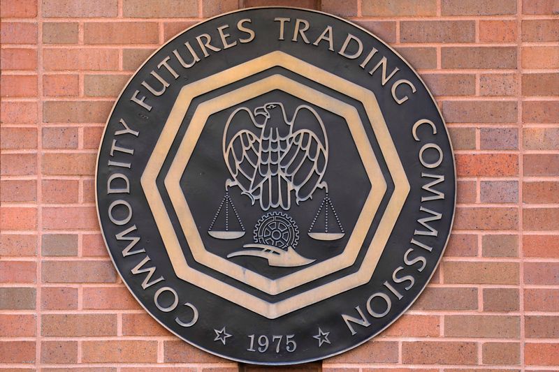 © Reuters. FILE PHOTO: Banners are seen outside the U.S. Commodity Futures Trading Commission (CFTC) in Washington, D.C., the United States on August 30, 2020. REUTERS/Andrew Kelly/File Photo