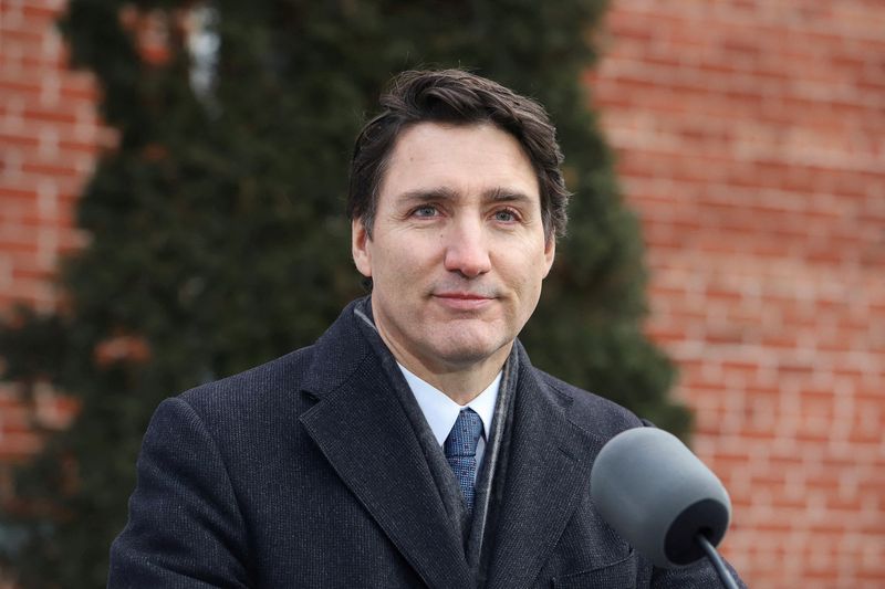 &copy; Reuters. Canada's Prime Minister Justin Trudeau speaks to reporters, announcing he intends to step down as Liberal Party leader, but he will stay on in his post until a replacement has been chosen, from his Rideau Cottage residence in Ottawa, Ontario, Canada, Janu