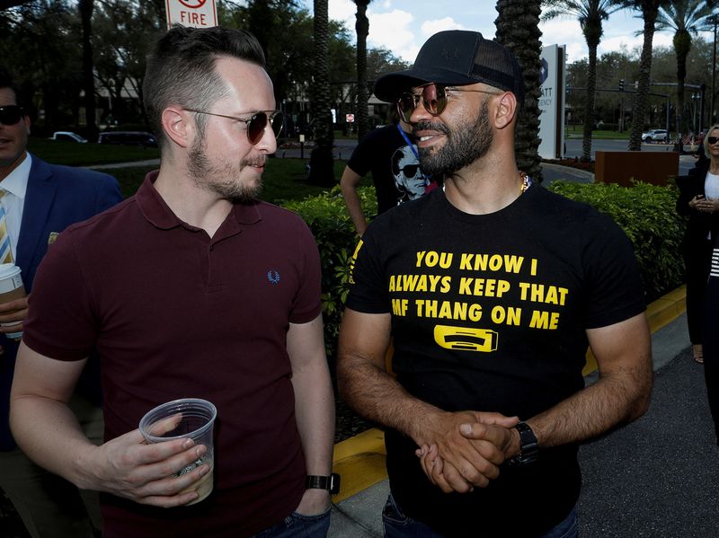 &copy; Reuters. FILE PHOTO: Enrique Tarrio (R), a leader of the Proud Boys, stands with an unidentified man outside the Conservative Political Action Conference (CPAC) in Orlando, Florida, U.S. February 27, 2021. REUTERS/Octavio Jones/File Photo