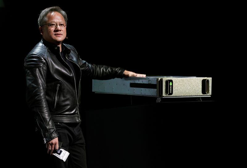 © Reuters. FILE PHOTO: Jensen Huang, CEO of Nvidia, shows his company's DGX AI supercomputer at his keynote address at CES in Las Vegas, Nevada, U.S. January 7, 2018. REUTERS/Rick Wilking/File Photo