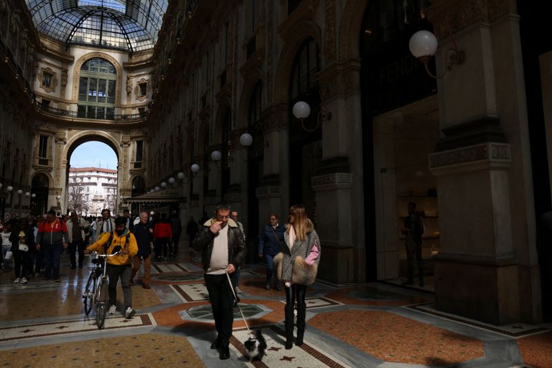 &copy; Reuters. FILE PHOTO: People walk in Galleria Vittorio Emanuele II, in Milan, Italy, March 25, 2024. REUTERS/Claudia Greco/Filer Photo