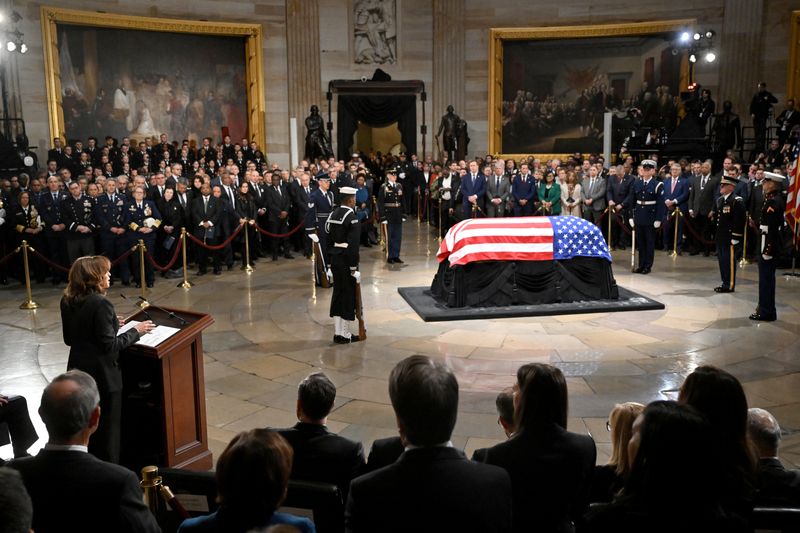 © Reuters. US Vice President Kamala Harris delivers a eulogy at the Lying in State Ceremony for former President Jimmy Carter at the US Capitol Rotunda in Washington, DC, U.S., January 7, 2025. Saul Loeb/Pool via REUTERS