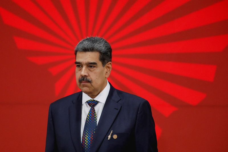 © Reuters. FILE PHOTO: Venezuelan President Nicolas Maduro looks on during a meeting of leaders of member states of the Bolivarian Alliance for the American Peoples and Trade and Promotion Treaty (ALBA-TCP), in Caracas, Venezuela on December 14, 2024. REUTERS/Leonardo Fernandez Viloria/File photo