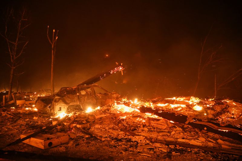 Wildfire rages in Los Angeles, forcing 30,000 to evacuate By Reuters