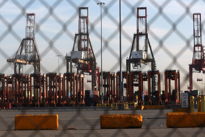 © Reuters. FILE PHOTO: Idle cranes are pictured at Port Newark Container Terminal as U.S. East Coast and Gulf ports resumed operations on Friday after unionized dockworkers reached a tentative labour agreement with an employer group for a new contract, ending a three-day strike in Newark, New Jersey, U.S., October 4, 2024. REUTERS/Mike Segar/File Photo