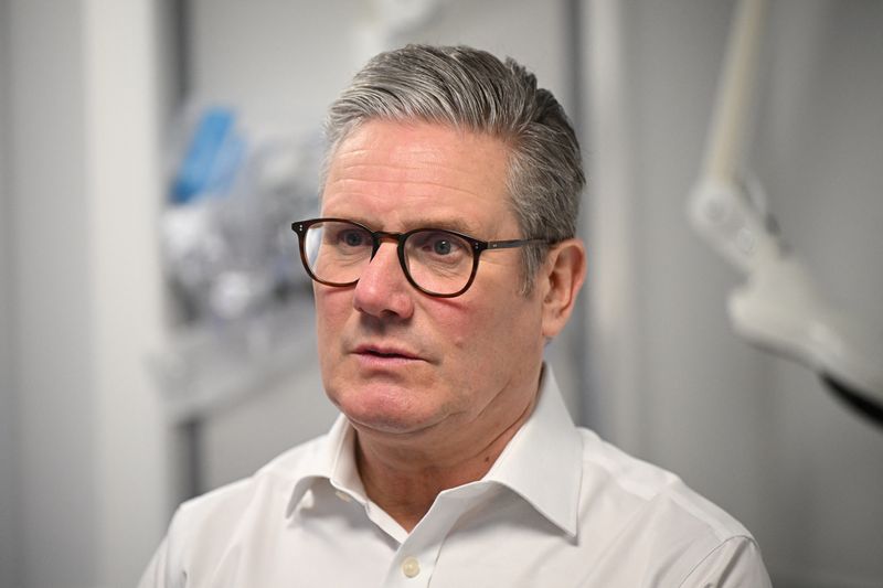 &copy; Reuters. FILE PHOTO: Prime Minister Keir Starmer visits the Elective Orthopaedic Centre in Epsom, to deliver remarks on reducing NHS wait times on January 6, 2025 in Epsom, United Kingdom.  Leon Neal/Pool via REUTERS/File Photo