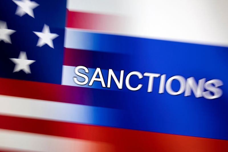 &copy; Reuters. FILE PHOTO: Word "Sanctions" is displayed on U.S. and Russian flags in this illustration taken, February 27, 2022. REUTERS/Dado Ruvic/Illustration/File Photo