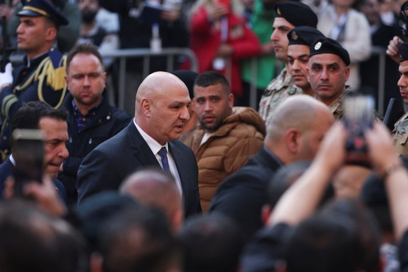 © Reuters. Lebanon's army chief Joseph Aoun walks after being elected as the country's President at the parliament building in Beirut, Lebanon, January 9, 2025. REUTERS/Mohamed Azakir