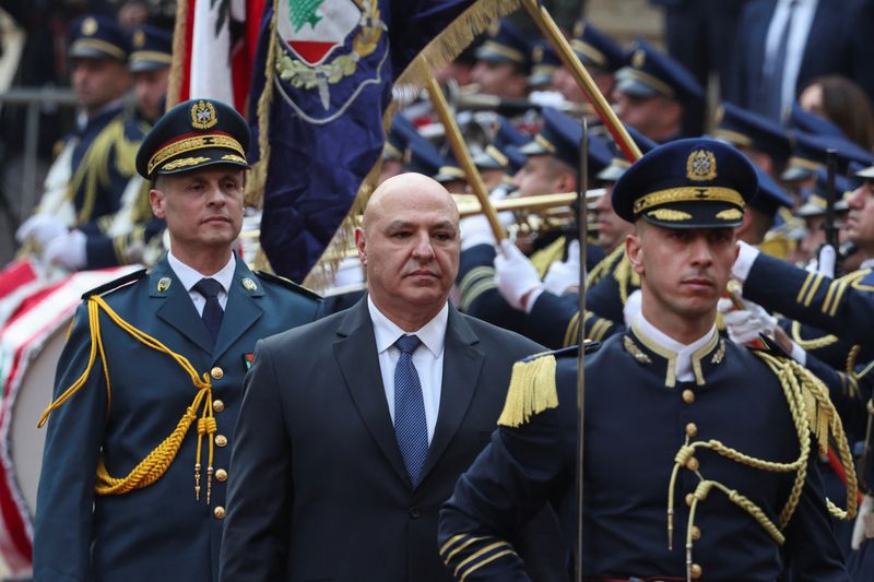 © Reuters. Lebanon's army chief Joseph Aoun walks after being elected as the country's President at the parliament building in Beirut, Lebanon, January 9, 2025. REUTERS/Mohamed Azakir