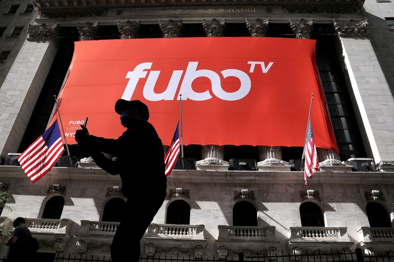 &copy; Reuters. FILE PHOTO: The fuboTV logo is hung from the New York Stock Exchange on the day of its IPO in the Manhattan borough of New York City, New York, U.S., October 8, 2020. REUTERS/Carlo Allegri/File Photo