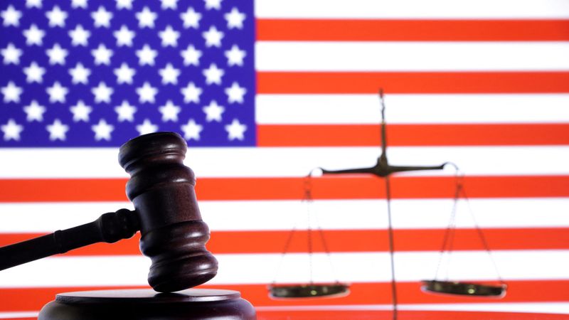 &copy; Reuters. FILE PHOTO: The U.S. flag, a judge gavel and a vintage scale are seen in this illustration taken August 6, 2024. REUTERS/Dado Ruvic/Illustration/File Photo