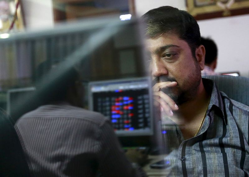 &copy; Reuters. FILE PHOTO: A broker reacts while trading at his computer terminal at a stock brokerage firm in Mumbai, India, August 24, 2015. REUTERS/Danish Siddiqui/ File Photo